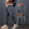 Pantalones de chándal Otoño Invierno Hombres Joggers Sueltos Primavera Otoño Cintura Elástica Normal Pantalones Casuales Hombres Deporte Pantalones Largos Marca de Moda Versátil