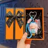 Llavero de Chica de Cabello Largo y Ondulado Creativo de Dibujos Animados Lindo Exquisito Adorno para Correa de Teléfono Colgante de Bolso Pequeño Regalo