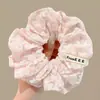 Goma para el pelo floral rosa para mujer 2026 Nuevo estilo Diadema de alta gama para coleta Alta elasticidad Banda para el pelo