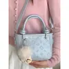 Bolso cubo de moda y sencillo para mujer, gran capacidad, nuevo de la primavera 2026, elegante estilo vintage, para el trabajo y los desplazamientos, bolso de hombro