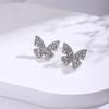 Nuevos pendientes de mariposa de alta gama con aguja de plata y diamantes, elegantes pendientes de celebridad de Internet de nicho de moda de alta gama que combinan con todo.