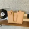 Bolsa de mão simples, moderna e na moda para mulheres, bolsa de ombro elegante com padrão de lichia para o dia a dia, bolsa versátil e chique para usar sob o braço