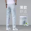Jeans de seda helada de alta gama italianos para hombre, pantalones largos casuales rectos finos de ajuste slim para verano, elásticos de color claro