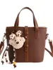 Moda de Nicho Otoño e Invierno 2025 Bolso de Mano para Mujer Bolso Cubo Estilo Coreano Simple Casual Bolso de Hombro Bolso de Mano