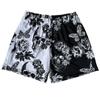 Pantalones cortos deportivos casuales americanos para hombre y mujer, de malla transpirable, holgados, con rodillas cruzadas.