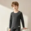 Conjunto de ropa interior térmica para niños, capa base sin costuras forrada de forro polar de grado A para niñas, ropa de otoño antibacteriana 7A para niños (arriba y abajo)