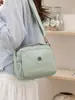 Elegante bolso cruzado de nailon para mujer, con múltiples compartimentos, diseño ligero y forma cuadrada casual, perfecto para llevar un teléfono