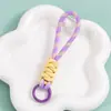Nuevo Color Dopamina Nudo de Diamante Cordón Tejido a Mano Funda para Teléfono Móvil Llavero Colgante de Bolso de Moda Hebilla de Cuerda