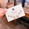 Verano nuevo chapado en oro real exquisitos tres pares de aretes pequeños de alto sentido pequeños frescos dulces aretes de temperamento combinables