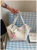 Bolsa Feminina 2026 Nova Primavera/Verão de Axila de Alto Padrão Exquisite para o Dia a Dia Bolsa de Ombro Único Bolsa Tote Tecida de Grande Capacidade