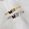 Lele Jewelry Moda Concha Negra Mariposa Pulsera Electrochapada de Acero de Titanio con Doble Incrustación de Diamantes Pulsera de Primavera Moderna y Simple para Mujer
