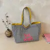 2026 Bolso de Lona de Gran Capacidad Nuevo Bolso de Tela Rayada Estilo Coreano Simple Casual Versátil Bolso de Hombro para el Trabajo