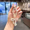 Llavero de arco de arcilla con diamantes completos, colgante de cadena de cuentas de cristal de moda, accesorio de bolso para chica dulce y genial, cadena para colgar el teléfono