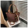 Bolso Cubo Casual de Moda Retro para Mujer 2026 Primavera Nuevo de Moda para Viajes Diarios Bolso de Hombro Texturizado
