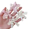 Presilha de Cabelo Laço de Miçangas em Formato de Coração Doce 2026 Novo Estilo Jovem Presilha Lateral para Franja Versátil