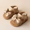Sandálias de comércio exterior 2025 verão novas sandálias para meninas sandálias coreanas com laço para bebê sapatos de praia sapatos de princesa para crianças