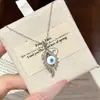 Collar con colgante de ojo de diablo personalizado transfronterizo europeo y americano con diamantes microincrustados, cadena de clavícula de nicho de alta gama para mujer