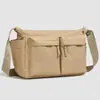 Bolso bandolera de gran capacidad para otoño e invierno para mujer, nuevo modelo 2026, mochila de viaje unisex, bolso de tela de color liso ligero casual