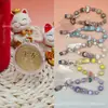 Colgante pequeño de oro puro 999 "Te amo por diez mil años", serie Labubu, con cordón para colgar, un regalo promocional para tiendas de oro