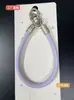 Nova pulseira de couro triangular com fivela dupla para celular, acessório universal, pulseira simples com fivela dupla, corrente de suspensão anti-queda