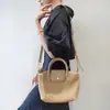 Venta al por mayor transfronteriza de bolsos de mano estilo dumpling de piel de vaca de primera capa estilo coreano, bolsos cruzados, bolsos de cuero genuino suave simples urbanos casuales para mujer