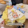 Camiseta de Manga Larga para Niños 2026 Primavera Nuevo Estilo Parche de Dibujos Animados Lindo Mangas Patchwork para Niños y Niñas Estilo Coreano Camiseta Base Moderna