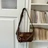 Bolso pequeño vintage de otoño e invierno para mujer 2026 nuevo bolso cruzado versátil de moda bolso de hombro exquisito súper popular bolso tipo albóndiga