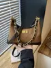 Bolso de hombro cruzado acolchado con cadena estilo Chanel para mujer, moda coreana de nicho, bolso de hombro y bandolera simple