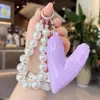 Estilo Coreano Ins Dulce Estilo Girly Relleno de Algodón Corazón Cadena de Perlas Colgante de Bolso Accesorios para Bolsos Llavero Colgante Pequeño