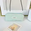 2025 Nova Bolsa Estojo Ins para Meninas Bolsa de Armazenamento de Papelaria de Alto Valor Literária Fresca Nicho Cor Pura Plissada Bolsa de Maquiagem