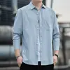 Camisa Masculina de Manga Curta Verão 2026 Novo Estilo Casual com Bolsos Moderna Respirável Camisa de Trabalho Fábrica em Estoque
