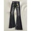 Jeans de campana de cintura baja retro americano en negro y gris para mujer, nuevos pantalones de campana ajustados con orejas de gato para primavera y otoño 2026