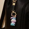 Nuevo llavero de flor de ciruelo con hebilla de resorte floral de cuero, colgante para bolso, accesorio DIY de superventas transfronterizo para parejas