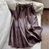 Otoño 2026 Nuevo Estilo Vintage Trendy Falda de Longitud Media de Cuero Proteico, Cintura Elástica que Reduce la Edad, Venta al por Mayor H15CQ6129