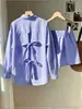 Conjunto de camisa de manga larga a rayas con decoración de lazo en la espalda sin espalda y cuello alto, y shorts de cintura alta, informal de primavera y otoño transfronterizo de Amazon