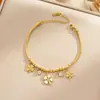 Pulsera de acero de titanio de cuerpo entero de venta caliente transfronteriza para mujer, temperamento de lujo ligero, coreana, galvanoplastia de oro real de 18K, venta al por mayor de joyería