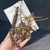 [Atacado] Estilo Ins Metal Coração Estampa de Leopardo Chaveiro Pingente Personalizado Tendência Suprimento para Lives de E-commerce