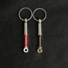Accesorios de modificación de coche transfronterizos, pequeño regalo para hombre, amortiguador de metal, colgante de neumático, llavero de cubo de rueda al por mayor