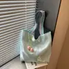 Bolso de mujer suave y liso de alta calidad, nuevo modelo 2026, bolso tote de gran capacidad para el trabajo diario, bolso de hombro versátil para comercio exterior