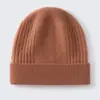 Gorro de cachemira para mujer 100% cachemira pura otoño e invierno casual color liso tejido de punto trenzado protección para los oídos cálido gorro de punto para la cabeza