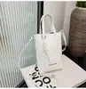 2025 Bolsa Popular de Cor Pura de Nicho Nova Tendência da Moda Feminina Ombro Único Transversal Simples Bolsa para Celular de Trabalho