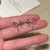 Pendientes de lazo de polvo de circonio para mujer, estilo dulce y moderno, accesorios de estilo extranjero, nicho ligero, temperamento de lujo, accesorios para las orejas de viajero, venta al por mayor