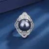 Anillo de perla de dos colores gris auberlite incrustado transfronterizo 2023 anillo de moda para mujer venta al por mayor
