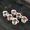 Taza de té de cerámica retro Venta directa de fábrica Juego de 6 tazas Copas de vino creativas Tazas de imitación esmaltada Tamaño pequeño Tazas de degustación de té Oferta especial