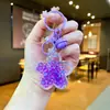 Llavero de Bolas de Burbujas Luminosas Sakura Adorno de Acrílico con Arena Movediza Colgante de Llavero de Flor Regalo Pequeño Festivo