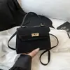 Bolsas de Alta Gama para Mujer 2025 Otoño Nuevo Bolso Kelly de Viaje de Moda Diseño Sencillo de Nicho Bolso de Hombro Único Cruzado