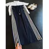Pantalones de seda helada de secado rápido con tres rayas para hombre, pantalones deportivos de fitness a rayas estilo americano de verano, pantalones casuales rectos para exteriores, modernos