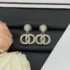 Brincos Chanel Inspirados Estilo Novo 2025 com Logo, Design Gota de Água Duplo C Totalmente Cravejado, Pino de Prata, Brincos de Luxo de Alta Qualidade Atacado