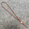 O fabricante direto Guan Shanyue oferece cordões de jade fumaça verde, pérolas, cordões de pérolas multicoloridos e outros acessórios para roupas tradicionais, leques, etc.