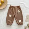 Pantalones Waffle para Niños 2026 Primavera/Otoño Nuevos Transpirables Cómodos Amigables con la Piel Casuales Lindos Oso Pequeño Pantalones Largos